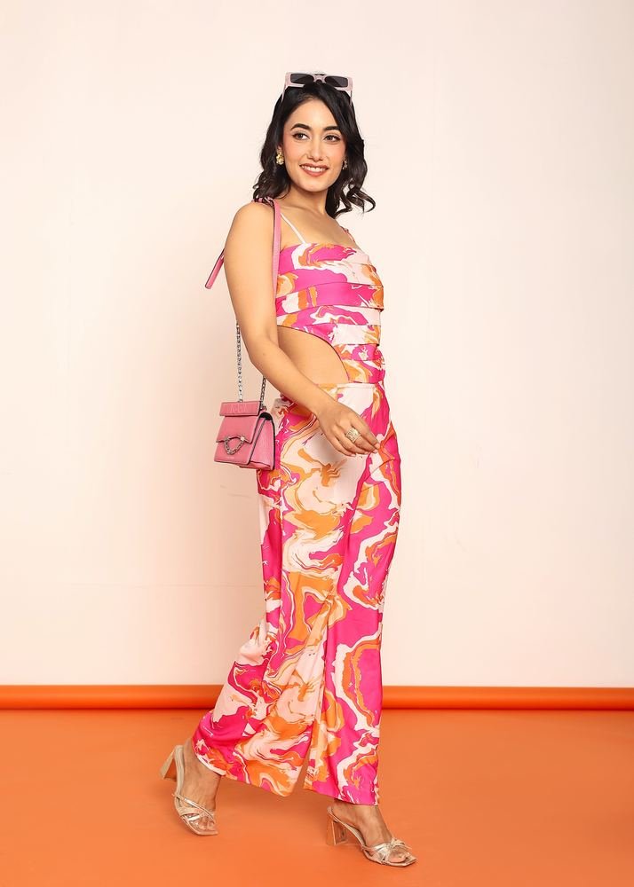 Printed jumpsuit with side waist cutouts