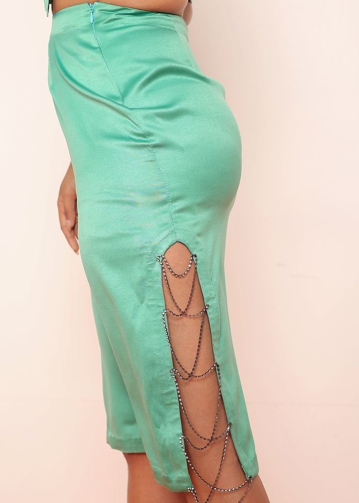 Green body hugged rhinestone skirt photo 2