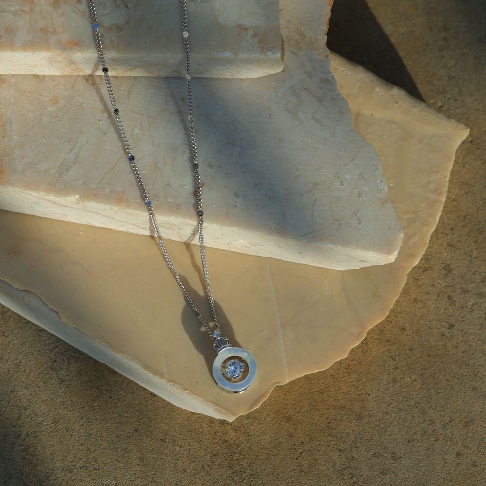Silver Radient White Pendant